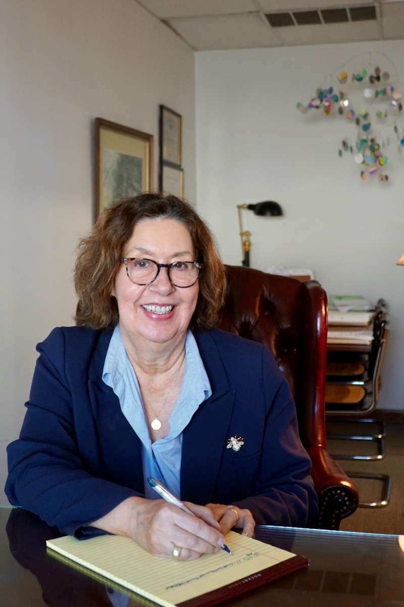 Lorelei M. Lanier reviewing estate planning documents at her office at 2029 Riverside Drive, Upper Arlington, Ohio