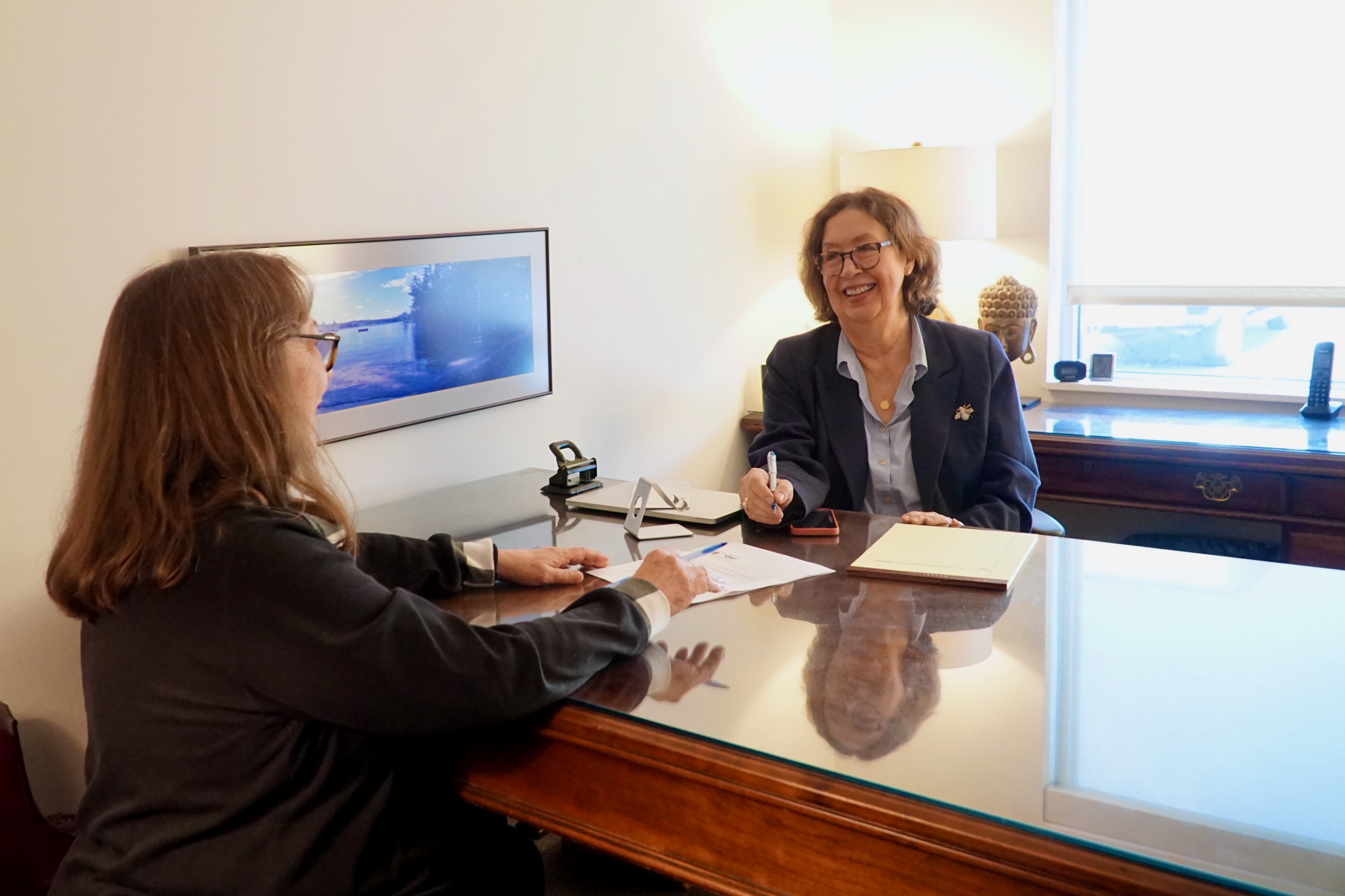 Lorelei M. Lanier meeting with a client at her estate planning law office in Upper Arlington, Ohio